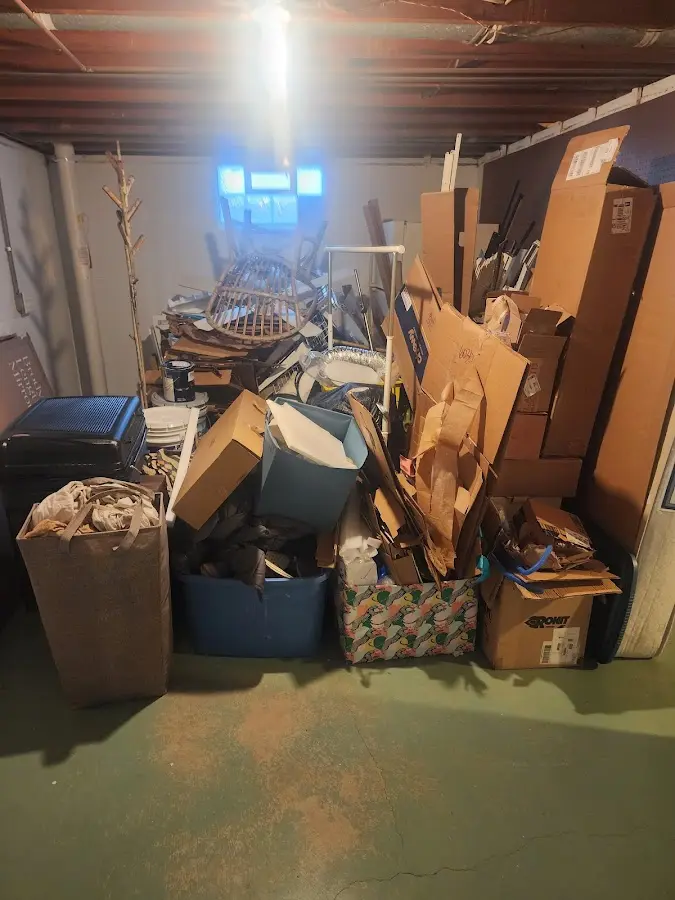 Roll-off dumpster container at job site for 4 Yard Dumpster Rental in Carolina Forest